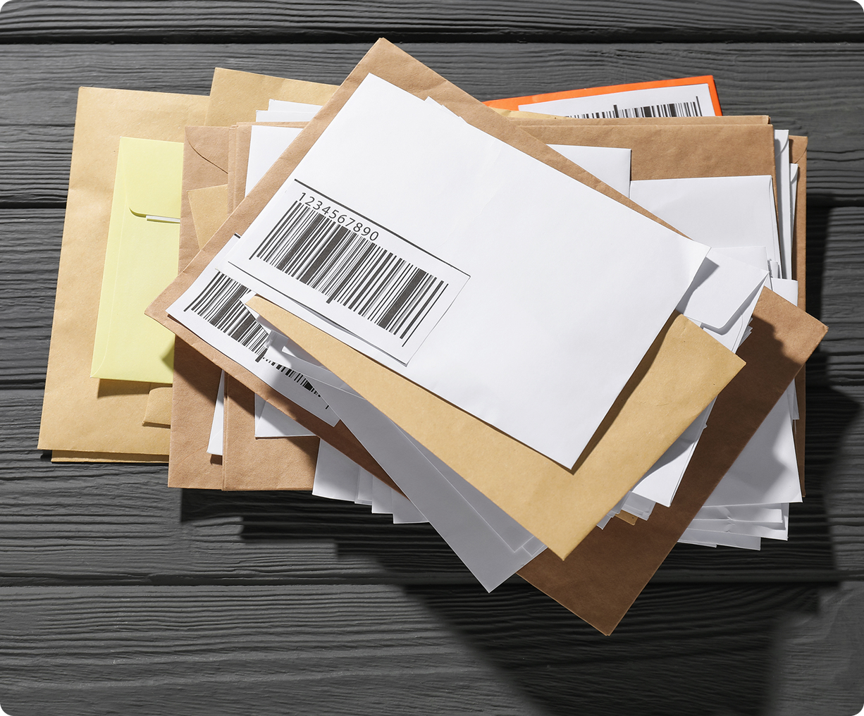 Stack of envelopes with barcodes