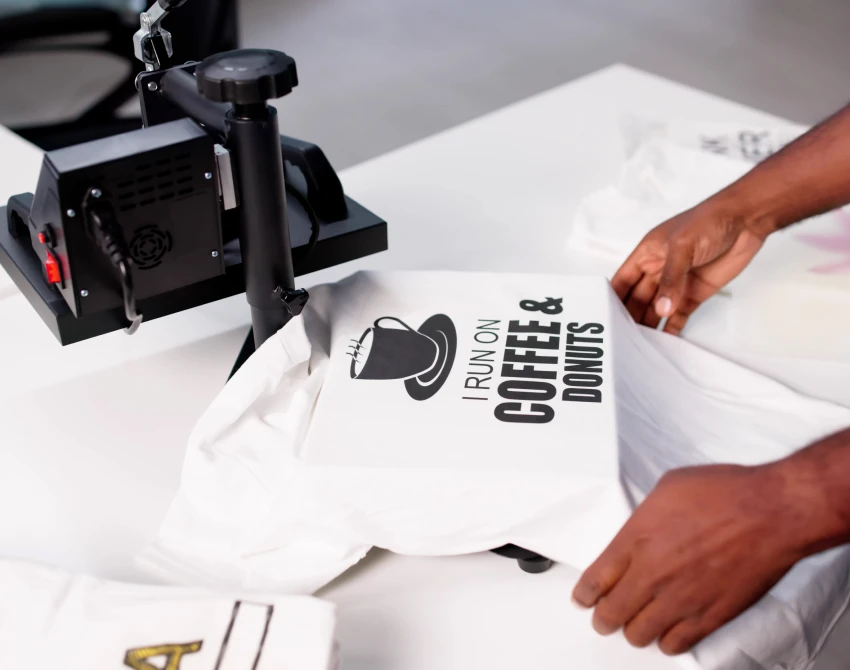 Person printing coffee and donuts T-shirt