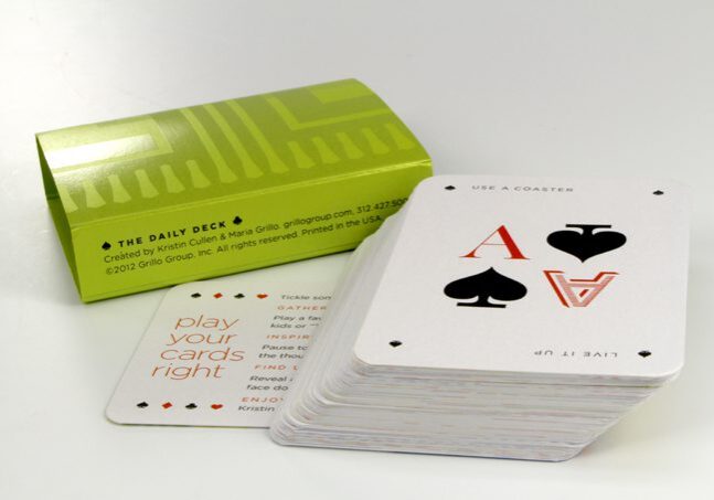 Stack of cards and green packaging