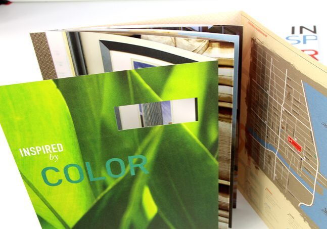 Open book showing vibrant green cover